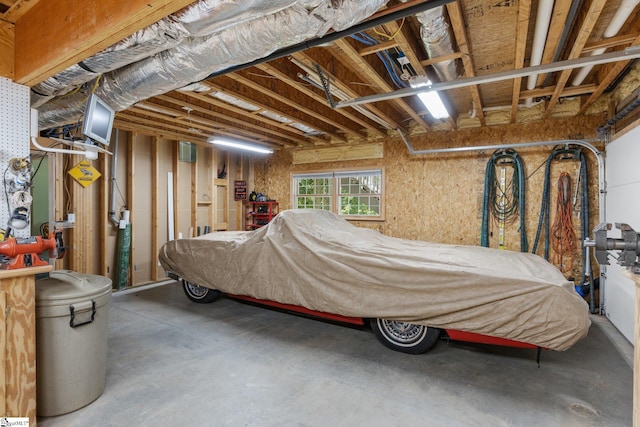 bedroom featuring concrete flooring