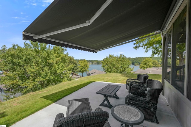 view of patio / terrace featuring a water view