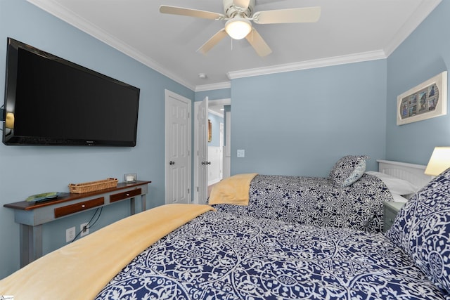 bedroom with ornamental molding and ceiling fan