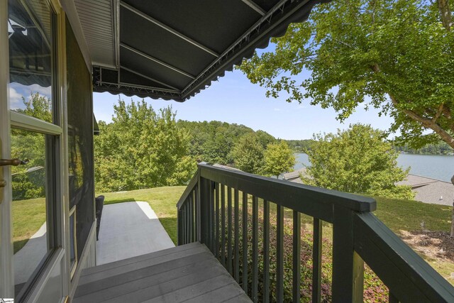 balcony featuring a water view