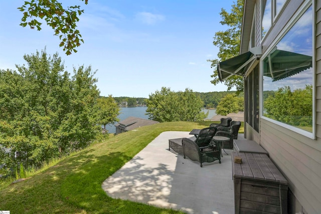 view of patio / terrace with a water view