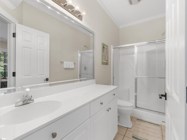 bathroom featuring tile patterned floors, walk in shower, toilet, vanity, and ornamental molding