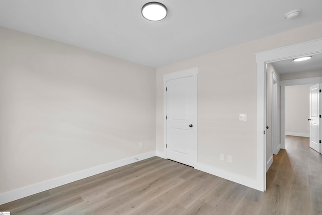 unfurnished bedroom featuring wood-type flooring