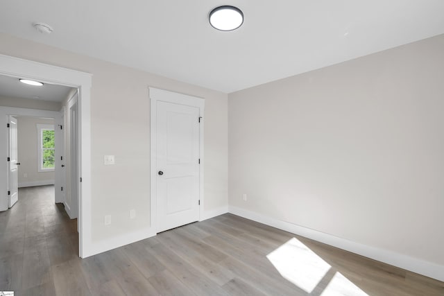 103 Leon Dr, Anderson, SC 29621 - unfurnished bedroom with baseboards and wood finished floors