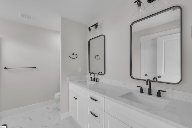 103 Leon Dr, Anderson, SC 29621 - full bathroom featuring marble look tiles, toilet, baseboards, and double vanity