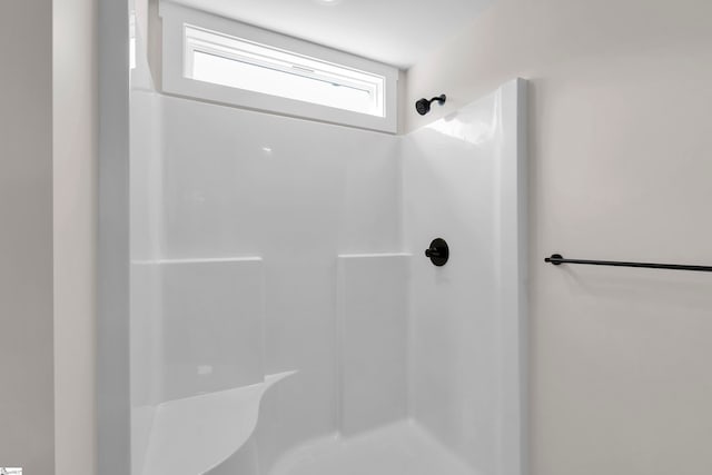 bathroom with walk in shower