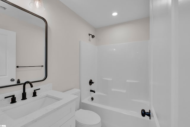 full bathroom with vanity, toilet, and bathtub / shower combination