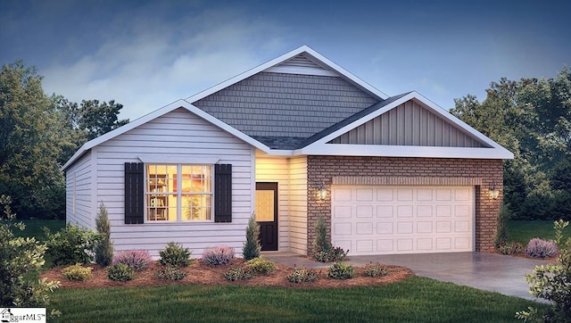 view of front of home featuring a front yard and a garage