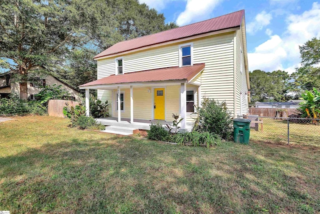 view of front of property with a front lawn and a porch