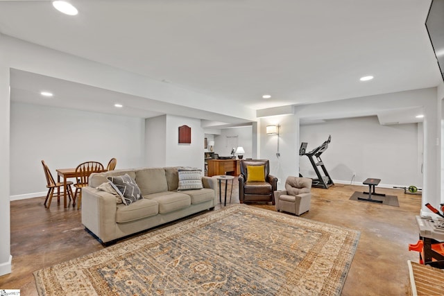 living room featuring concrete flooring