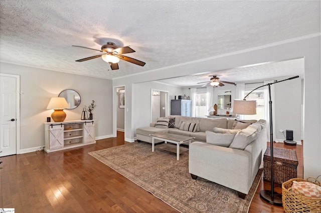 living room featuring a textured ceiling, ceiling fan, and dark hardwood / wood-style flooring