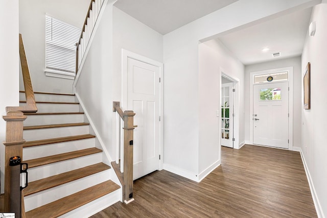 entryway featuring dark wood-type flooring