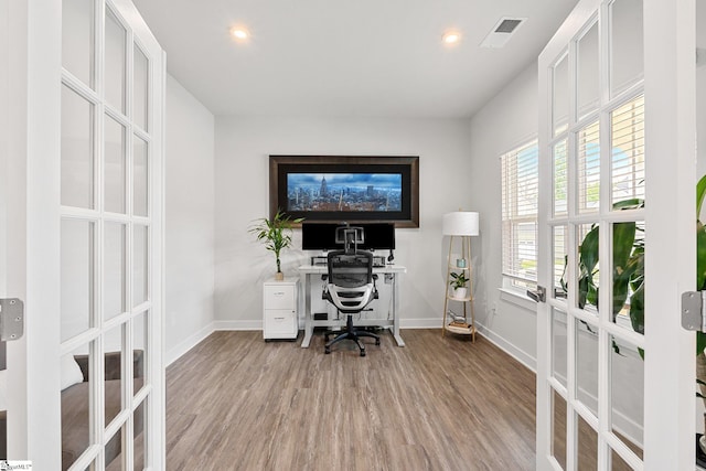 office featuring light hardwood / wood-style floors