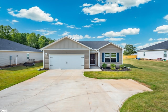 view of front facade with a front lawn and a garage