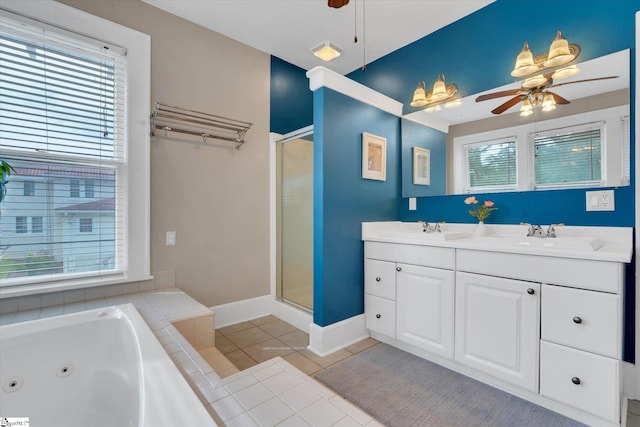 bathroom featuring vanity, plenty of natural light, ceiling fan, and shower with separate bathtub