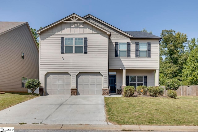 view of front of house featuring a garage and a front yard