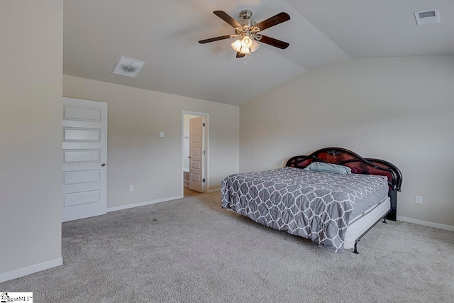 carpeted bedroom featuring vaulted ceiling and ceiling fan