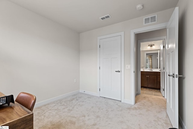 home office featuring light colored carpet