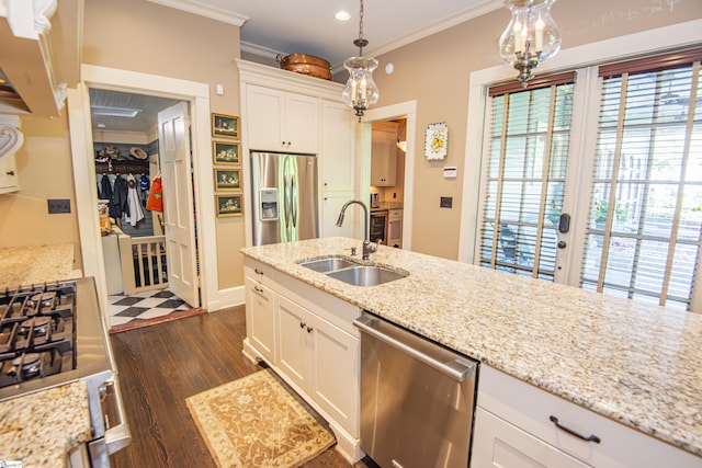 571 E Main St, Spartanburg, SC 29302 - kitchen featuring stainless steel appliances, a sink, crown molding, dark wood-type flooring, and white cabinetry