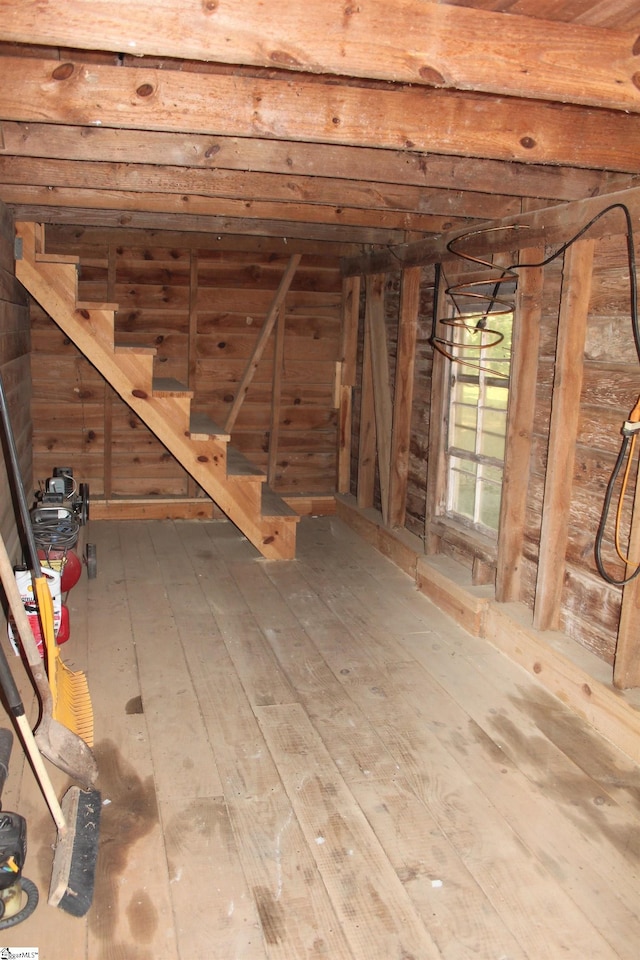 basement with wood-type flooring