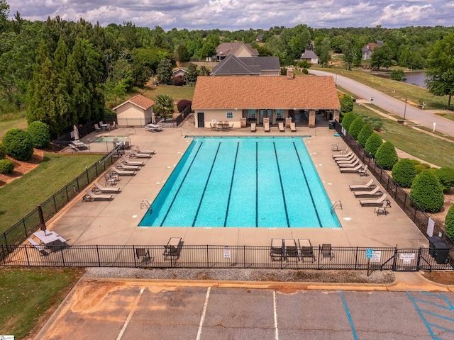 view of swimming pool with a patio area