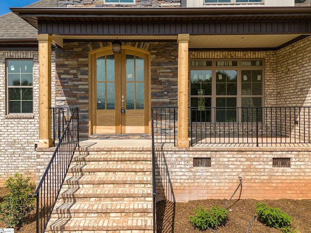 property entrance with covered porch