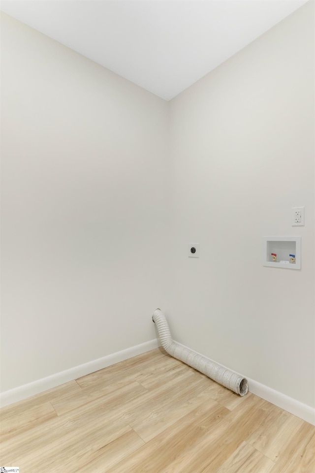 laundry room featuring baseboards, light wood finished floors, hookup for an electric dryer, laundry area, and washer hookup