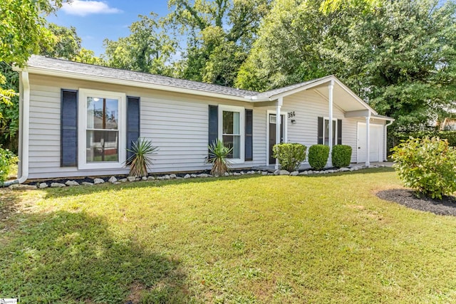 ranch-style home featuring a front lawn