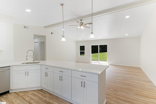 kitchen with light wood finished floors, visible vents, dishwasher, and a sink