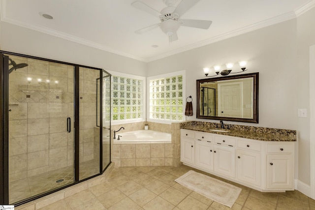 bathroom featuring vanity, ceiling fan, ornamental molding, and shower with separate bathtub