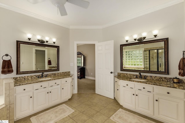 bathroom with ornamental molding, vanity, ceiling fan, and tile patterned floors