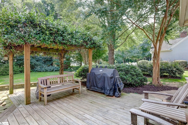 wooden terrace with a grill