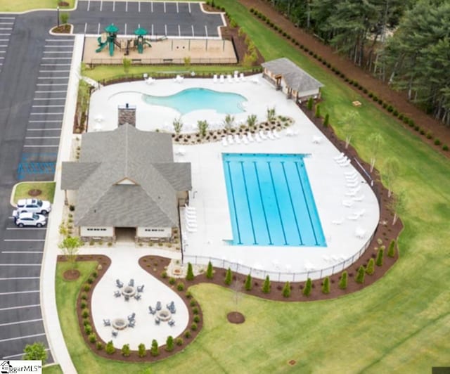 view of pool featuring a patio area