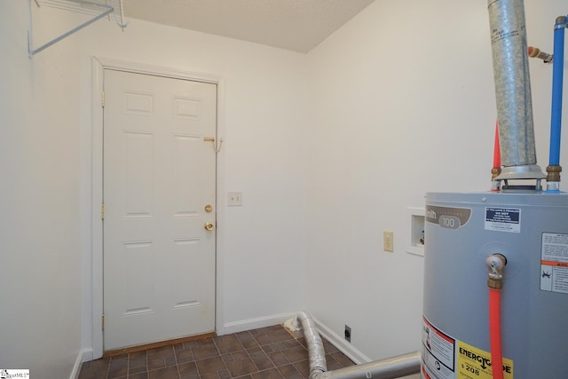 washroom with washer hookup, hookup for an electric dryer, and water heater