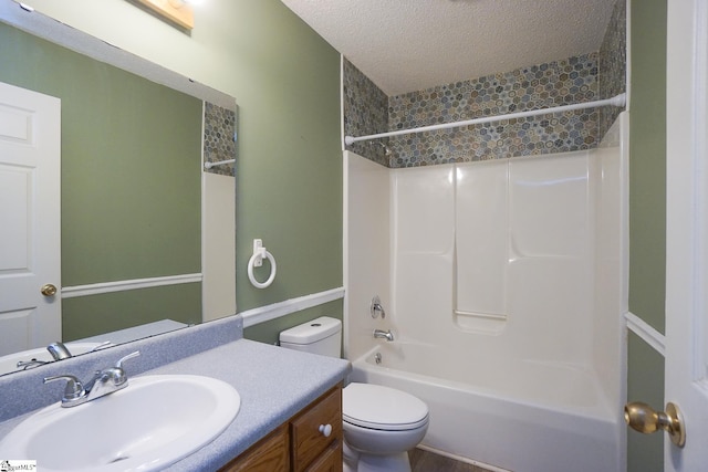 full bathroom featuring vanity, toilet, a textured ceiling, and tub / shower combination