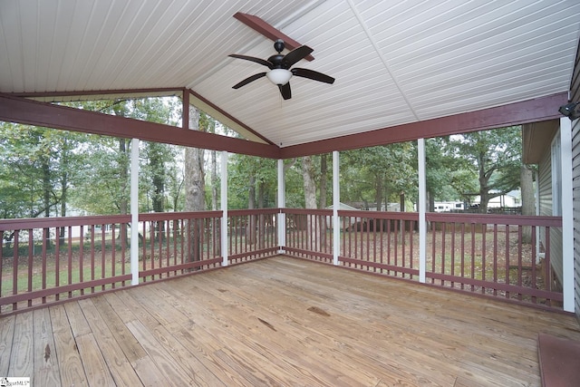 unfurnished sunroom with lofted ceiling and ceiling fan