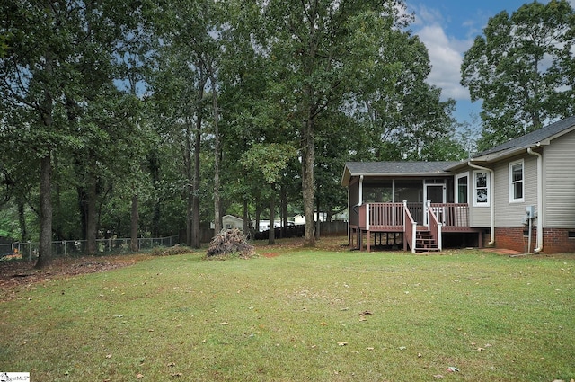 view of yard with a shed and a deck