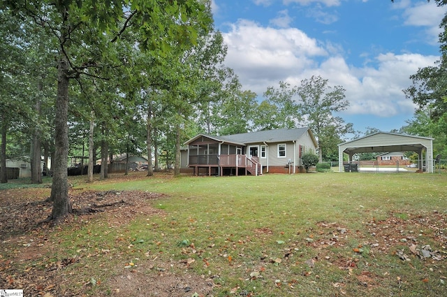 view of yard featuring a gazebo and a sunroom