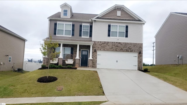 craftsman inspired home featuring covered porch, driveway, brick siding, a front lawn, and an attached garage