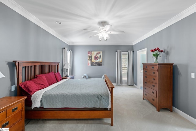 bedroom with light carpet, baseboards, ornamental molding, and a ceiling fan