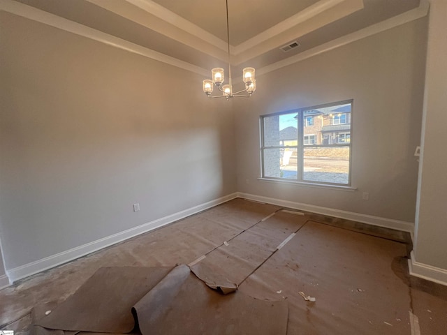 empty room featuring a chandelier