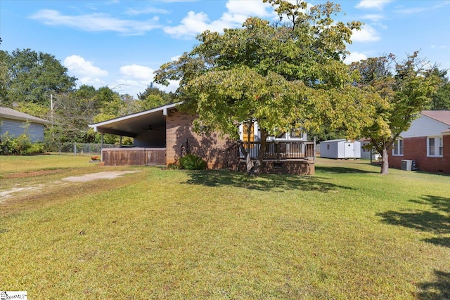 exterior space with a wooden deck and central air condition unit