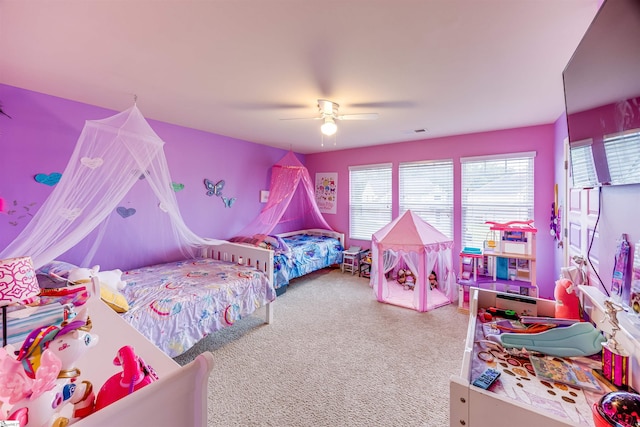 bedroom featuring ceiling fan and carpet floors