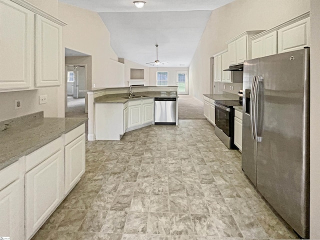 kitchen featuring lofted ceiling, ceiling fan, appliances with stainless steel finishes, and white cabinetry