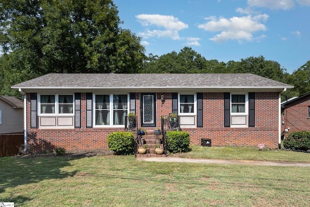 view of front of home featuring a front lawn