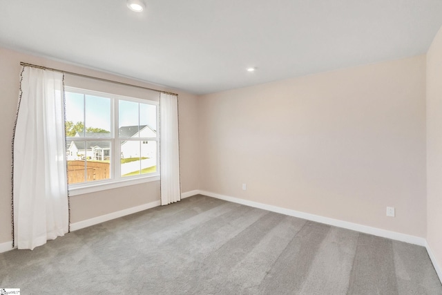 view of carpeted spare room