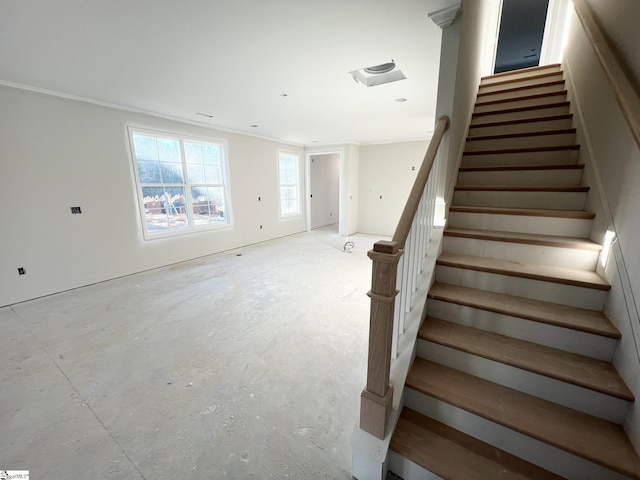 staircase with crown molding