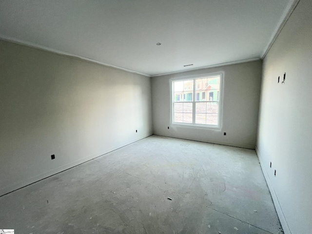 empty room featuring ornamental molding