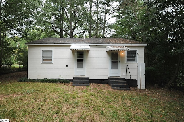 exterior space featuring a lawn