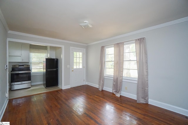 interior space featuring ornamental molding, stainless steel electric stove, dark wood-type flooring, and black refrigerator